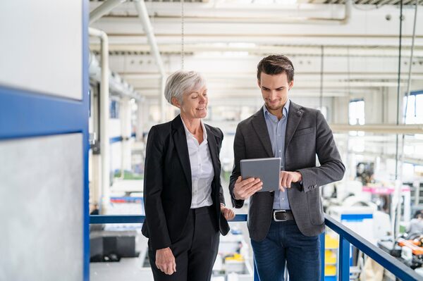 Two facilities executives review spending trends and set NTEs for future work order management.