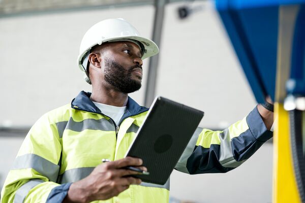 Technician uses Corrigo Enterprise App to complete work onsite and record asset service record.